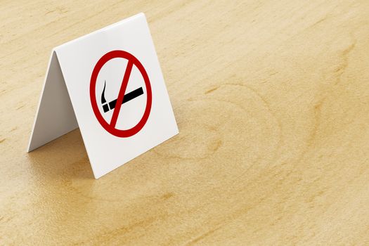 No smoking sign on wooden table in the restaurant or cafe