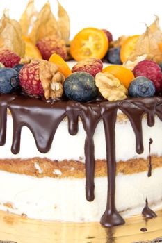 Birthday cake with fruits close up