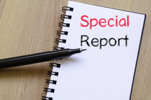 Special report text concept write on notebook