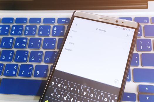 Close up Android device Showing Compose a new email application on the screen.