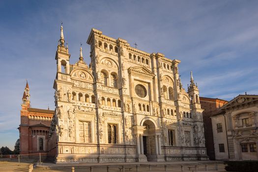 View of the cathedral of Certosa di Pavia, Carthusian monastery at sunset.