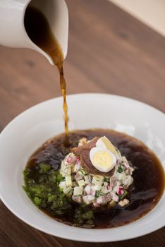 Traditional Russian kvass soup with vegetables - okroshka