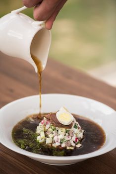 Traditional Russian kvass soup with vegetables - okroshka