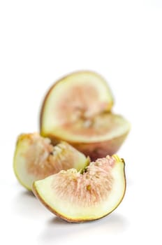 sliced fresh figs fruit on white background