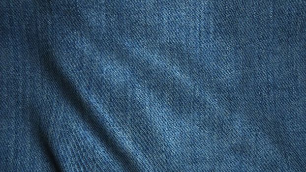 Realistic Ultra-HD jeans cloth waving in the wind. Seamless loop with highly detailed fabric texture. Loop ready in 4k resolution.