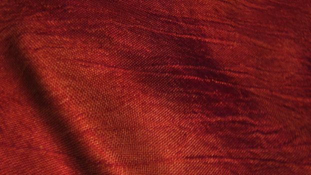 Red silk fabric blowing in the wind. Seamless loop