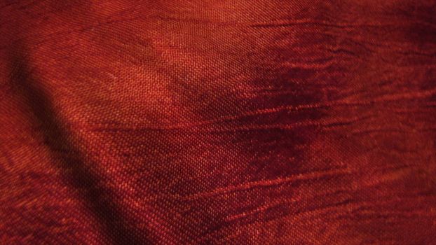 Red silk fabric blowing in the wind. Seamless loop