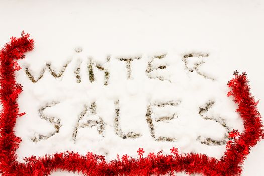 the  written winter sales sculpted in the snow