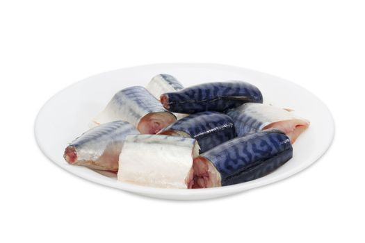 Sliced pickled atlantic mackerel on a white dish on a light background
