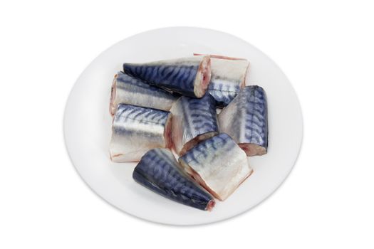 Sliced pickled atlantic mackerel on a white dish on a light background
