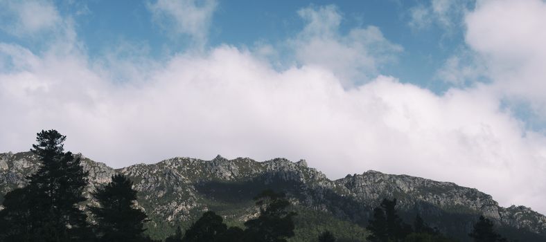 View of a rocky some rocky mountains in a township of Tasmania.