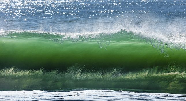 Big wave break spray in the Pacific Ocean