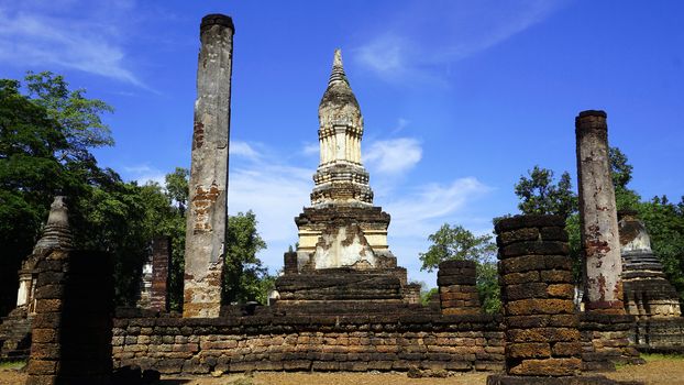wat chedi seven rows temple pagoda ruins landscape in Sukhothai world heritage