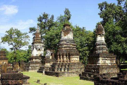 Historical Pagoda Wat chedi seven rows temple in Sukhothai world heritage