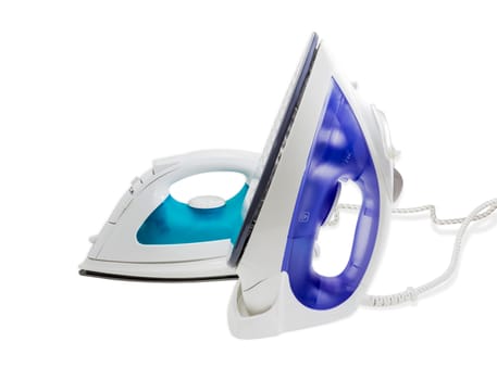 Two modern electric steam iron on a light background. Isolation.
