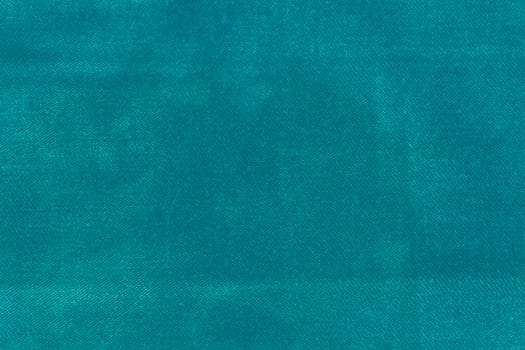 The Velvet fabric texture in turquoise color.