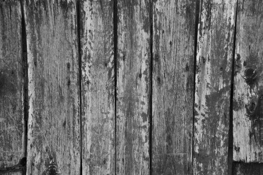 Vertical weathered painted grunge wooden boards background in black ad white