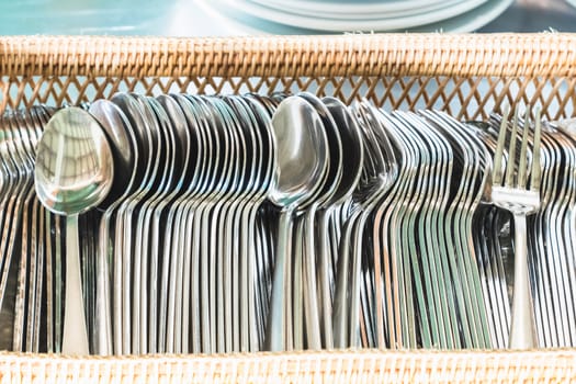 set of spoon and fork in basket