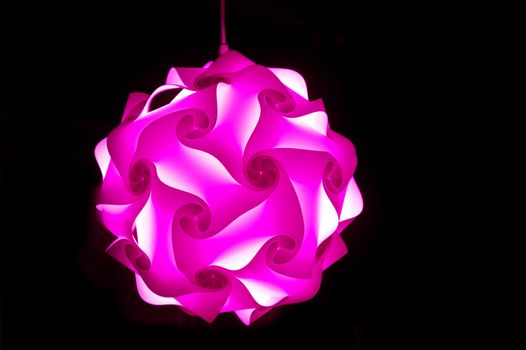 beautiful designer lamp on a black background.