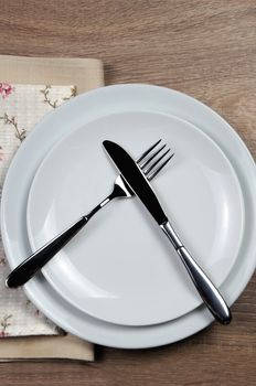 Dining etiquette - I still eat, do not like. Fork and knife signals with location of cutlery set