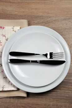 Dining etiquette - I still eat, finished  . Fork and knife signals with location of cutlery set