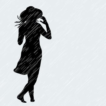 Woman with hat walking in the rain in a windy day