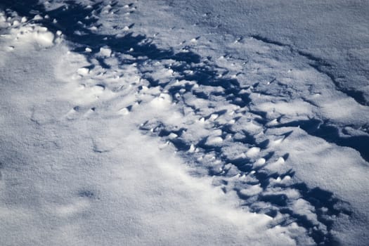 abstract seasonal background shadows on the snow field