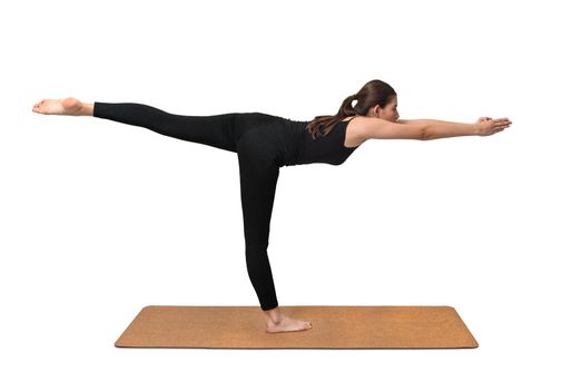 Yoga pose, young woman exercise on cork yoga mat on white background