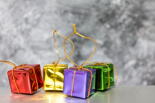 Gift Box And Baubles On Snow With Shiny Background