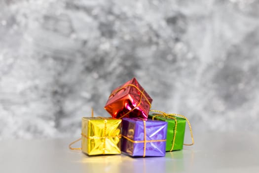 Gift Box And Baubles On Snow With Shiny Background