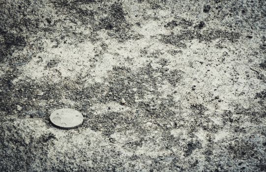 old coin on ground