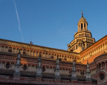 The Pavia Carthusian monastery is an important example of renaissance religious architecture,Italy at sunset.copy space.
