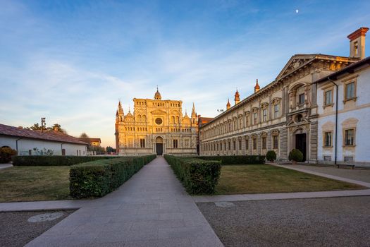 View of the cathedral of Certosa di Pavia Carthusian monastery at sunset.