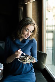 Portrait of beautiful girl in Cafe in the city