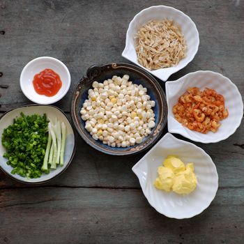 Vietnamese street food, corn fried dried shrimp, is popular snack food make from corn fry with shrimp, butter, scallions, eat with chilli sauce 