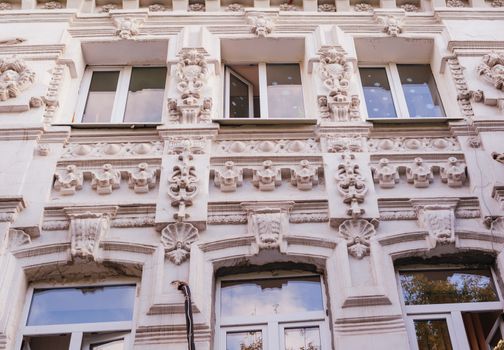 architecture of the historic building with Windows and arches.