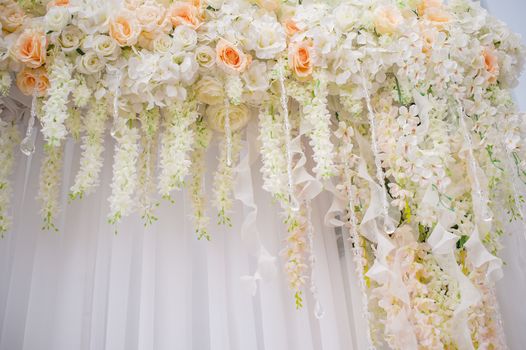 beautiful arch decorated with flowers for wedding ceremony.