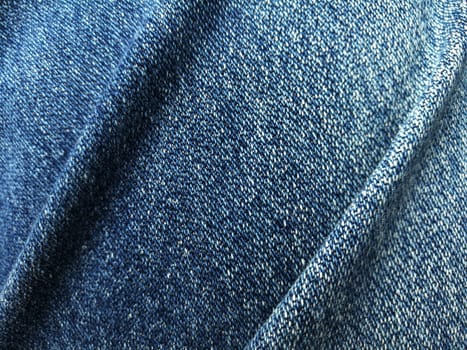 Close up blue jeans denim fold background and texture