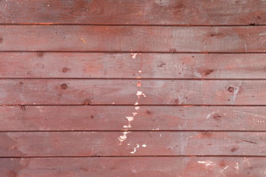 7 horizontal red worn painted wooden boards or planks rustic rural background