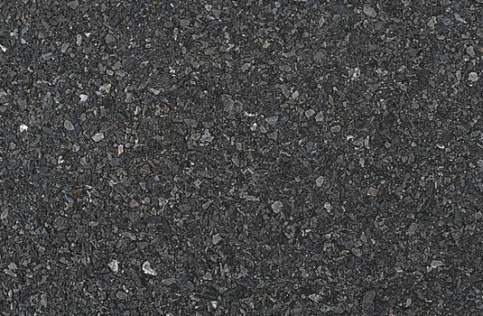 The gray background of black asphalt road.