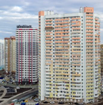 New housing estate with typical modern multi-storey apartment buildings in a big city cloudy day
