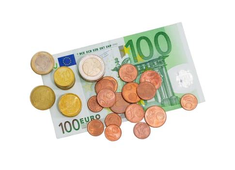 Several euro coins from 1 to 50 cents and in denominations of 1 and 2 euro on the background of banknote in denomination of 100 euro on a light background
