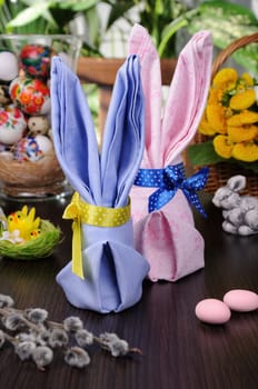 Napkin folded as an Easter bunny on a table
