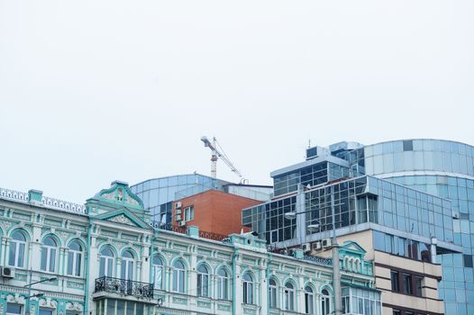 construction of multi-storey office building on the sky background.