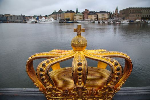 Skeppsholmsbron (Skeppsholm Bridge) with Golden Crown on a bridge in Stockholm, Sweden