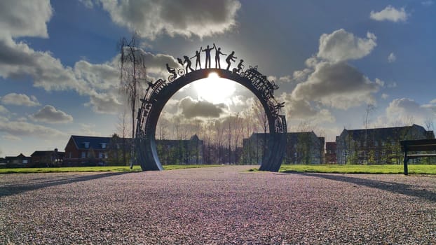 Arch on the background of the sun