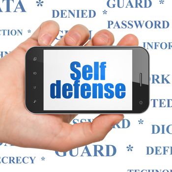 Privacy concept: Hand Holding Smartphone with  blue text Self Defense on display,  Tag Cloud background, 3D rendering