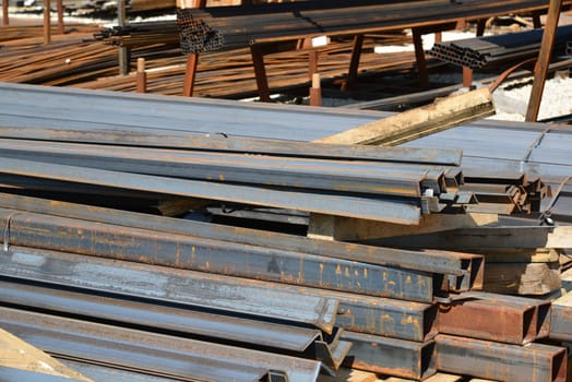 Gray paving slabs in piles on street