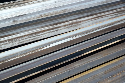 Gray paving slabs in piles on street