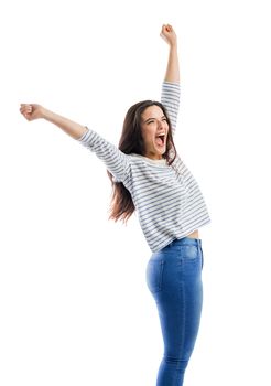 Happy woman with arms up and yelling of happiness 